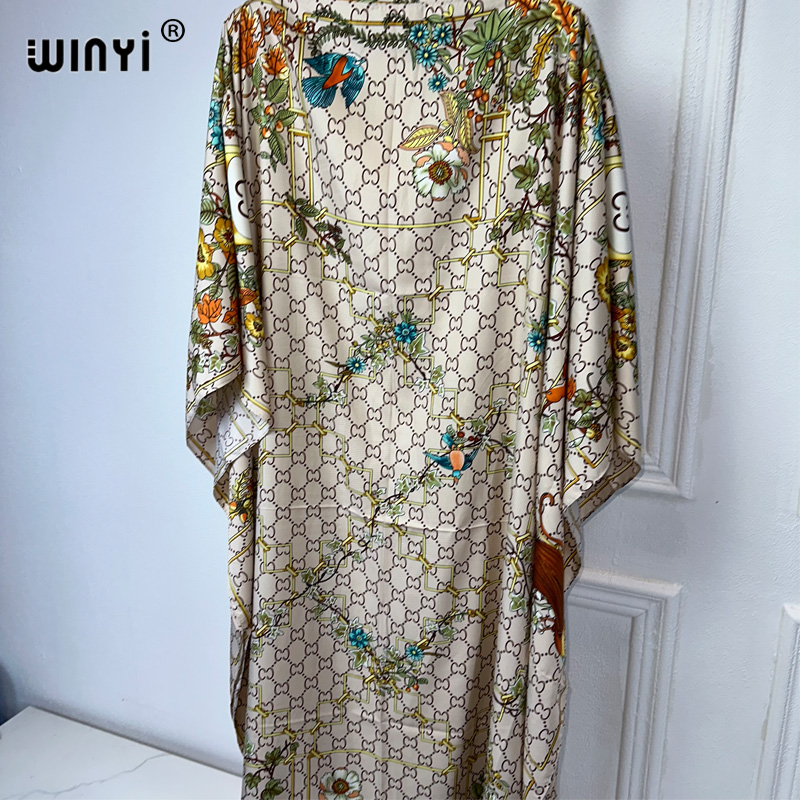 فستان طويل من WINYI للنساء ، ط - مراجعة Boho Summer Beach Maxi Dress وسعره